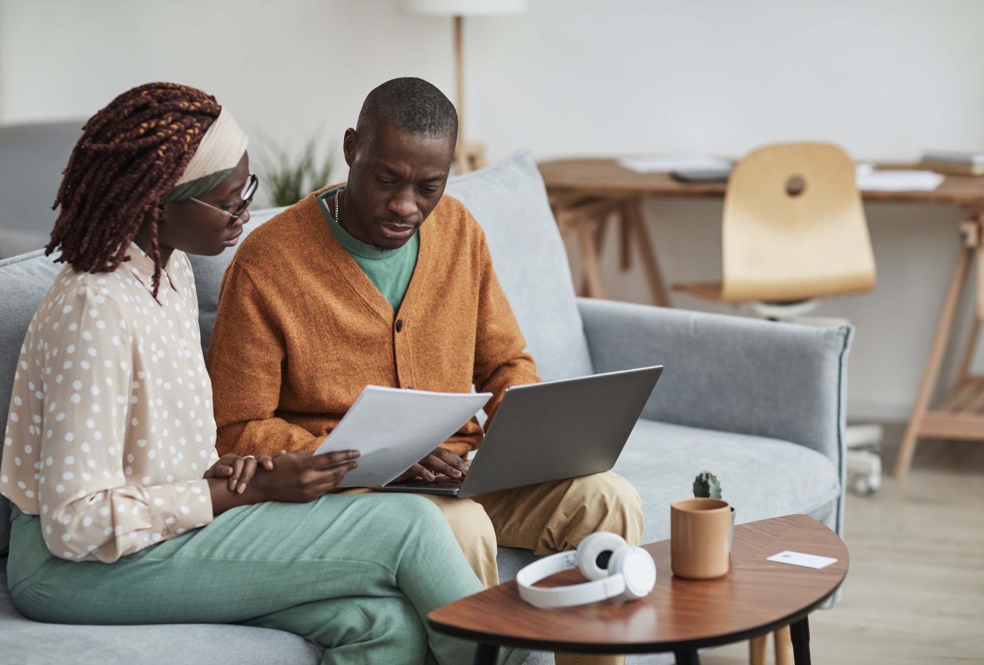 Modern African American Couple Working